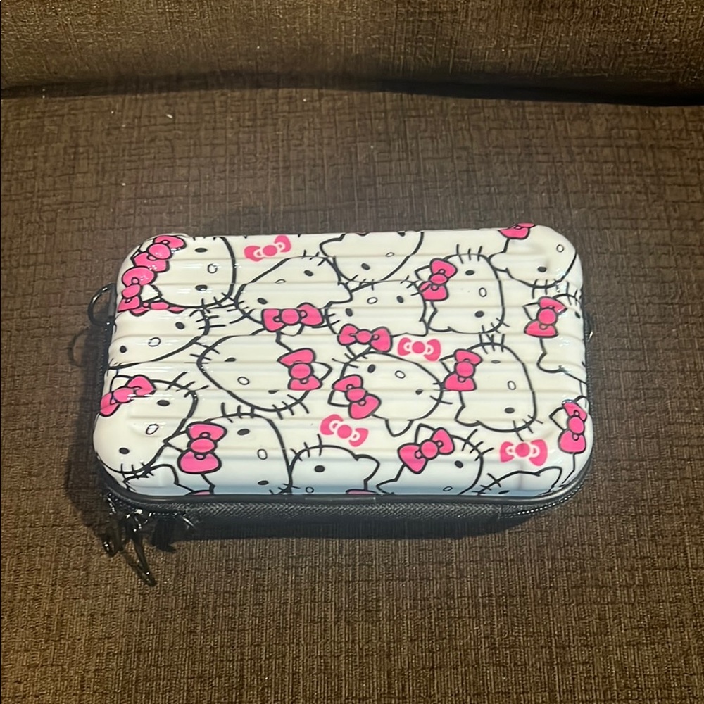 Hello Kitty Pink and White mini suitcase cross body bag.